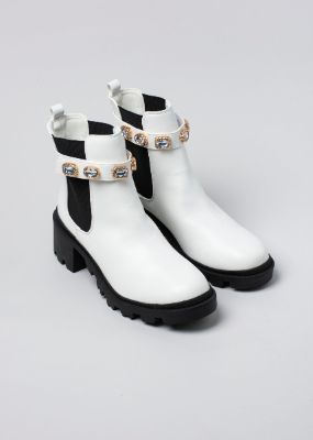 Botín suela track brillos sold by Shasa