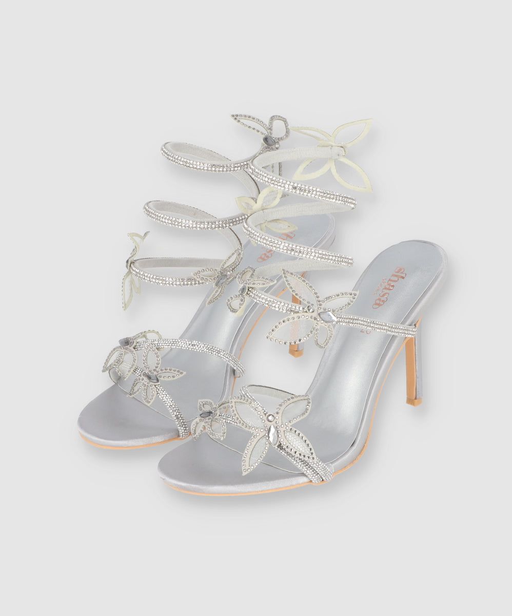 Tacon Serpiente Mariposas Brillos sold by Shasa