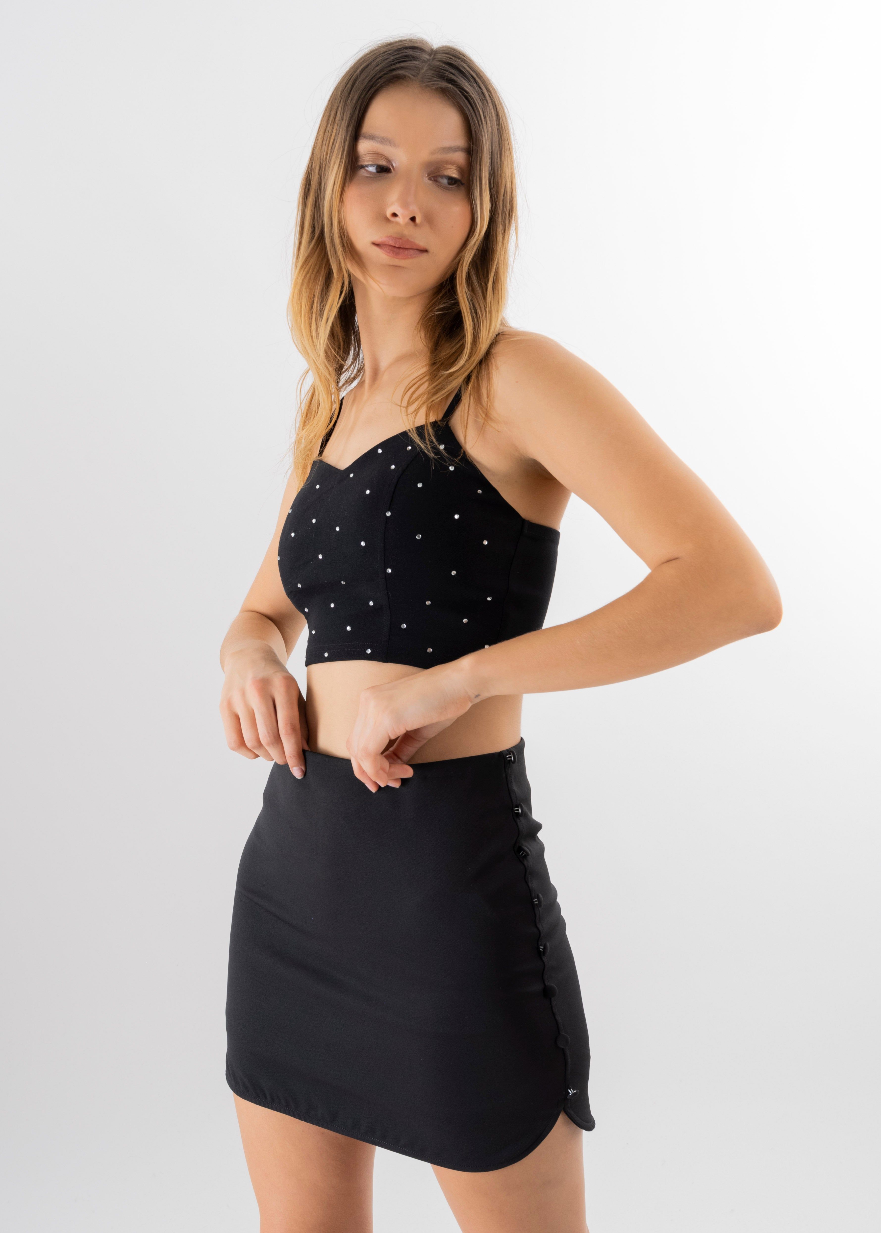 Top con detalle brillo tirantes sold by Shasa