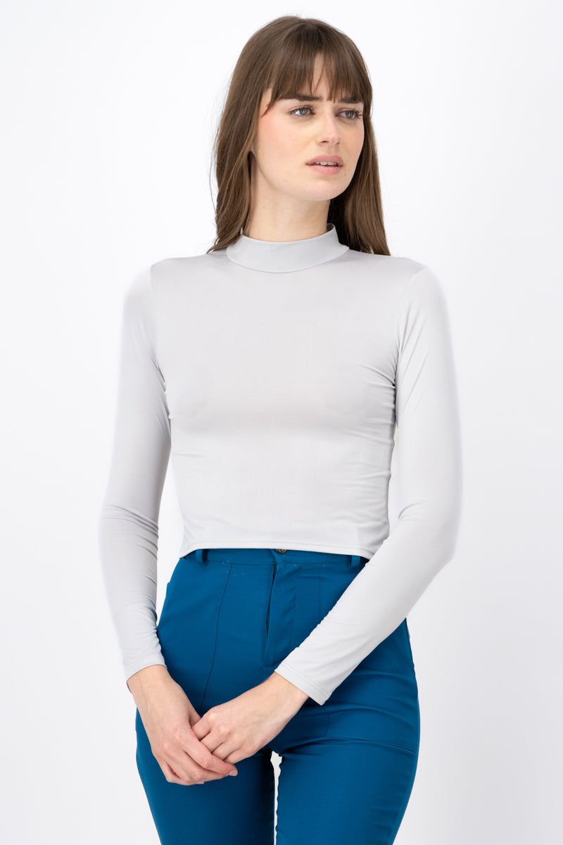 Top Manga Larga Cuello Alto sold by Shasa