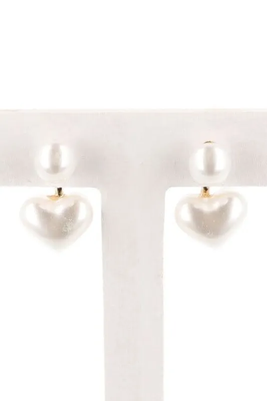 Aretes corazón aperlado sold by Shasa