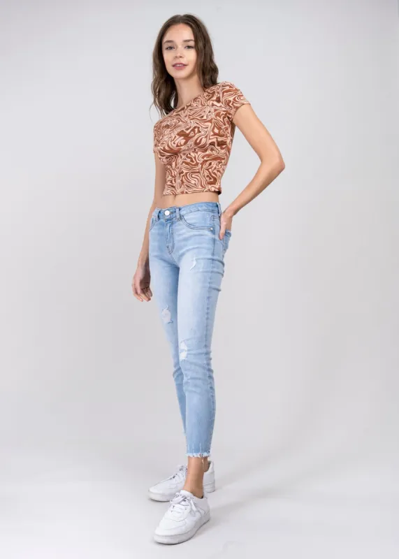 Jeans cintura media destrucciones flecos sold by Shasa