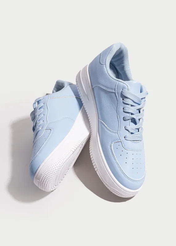 Tenis retro perforado sold by Shasa