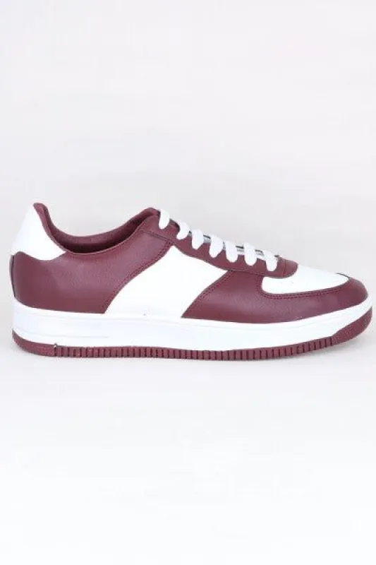 Tenis retro bicolor sold by Shasa