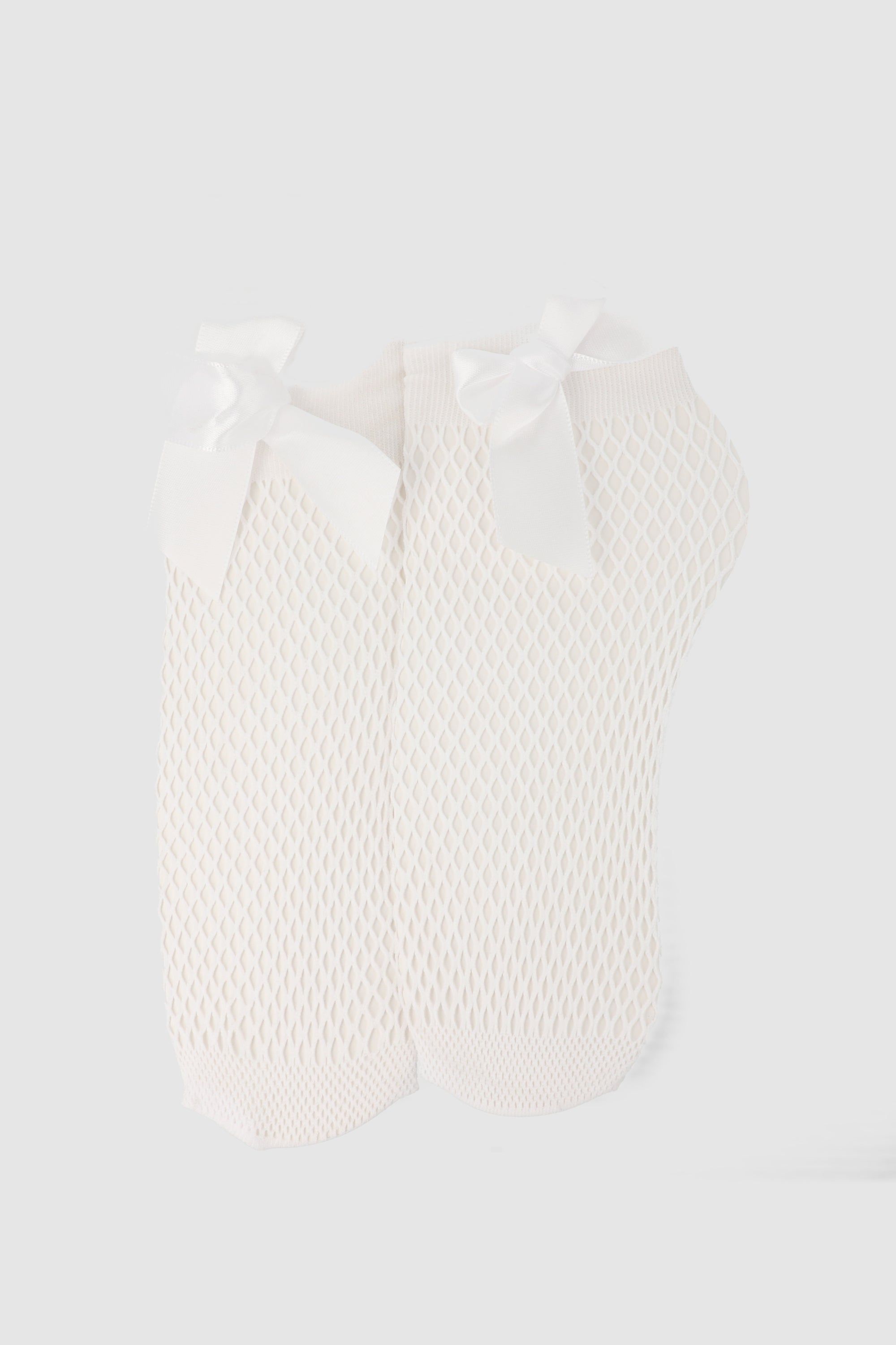 Calcetín De Red Con Moño sold by Shasa