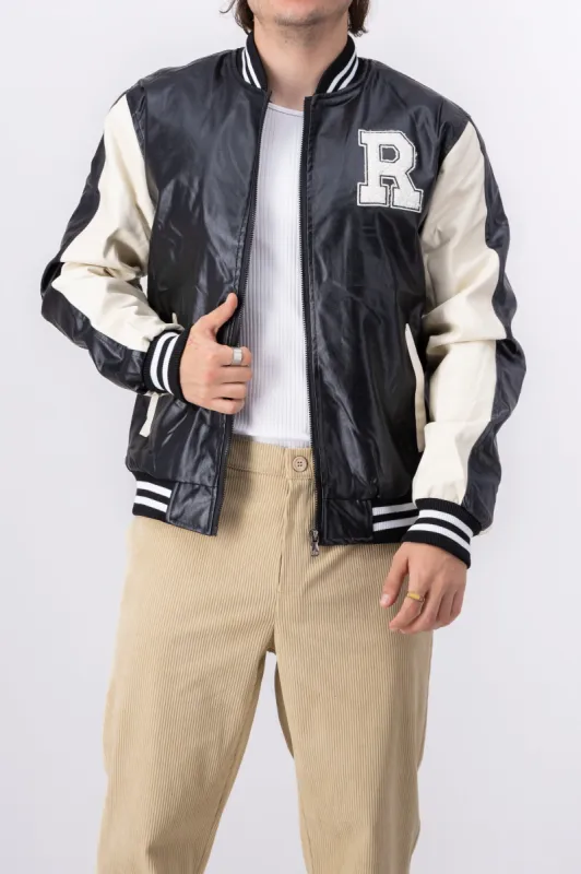 Chamarra efecto piel varsity R sold by Shasa