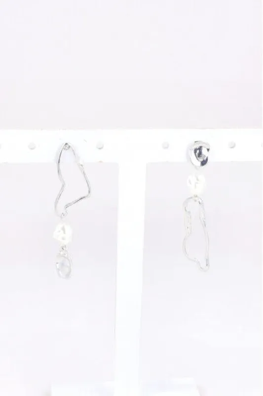 Aretes Perlas Derretido sold by Shasa