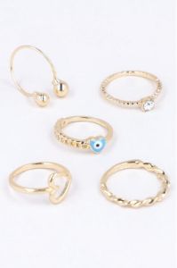 Set 5 anillos brillos sold by Shasa
