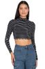 Top manga larga cuello alto rayas sold by Shasa