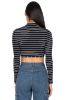 Top manga larga cuello alto rayas sold by Shasa