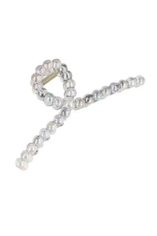 Pinza larga nudo círculos sold by Shasa