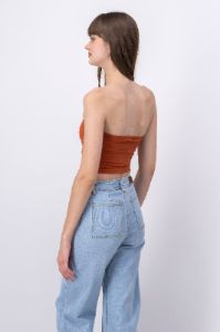Top strapless liso sold by Shasa