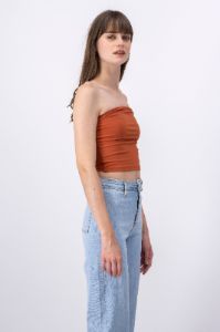 Top strapless liso sold by Shasa