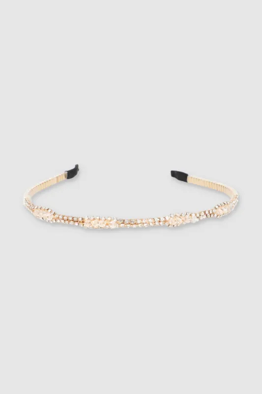 Diadema delgada metálica perlas sold by Shasa