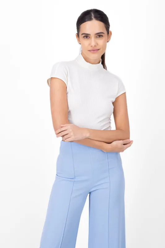 Top cuello alto rib sold by Shasa