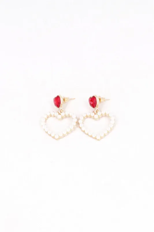 Aretes Colgantes Corazón Perlas sold by Shasa