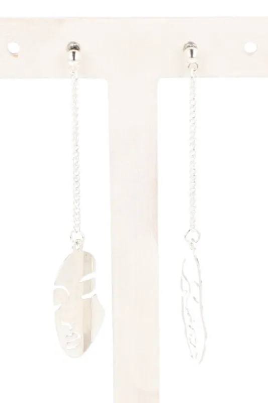 Aretes cara metálicos sold by Shasa