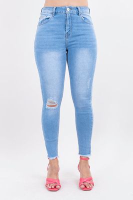 Jeans skinny con destrucción en rodilla sold by Shasa