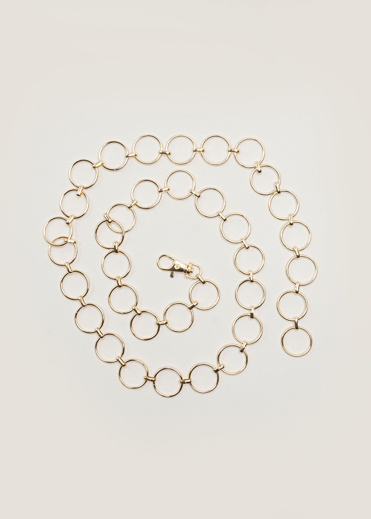 Cinturón Cadena Anillos sold by Shasa