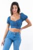 Top denim manga abullonada olán sold by Shasa