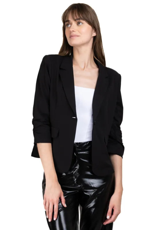 Saco manga 3/4 bolsos solapa sold by Shasa