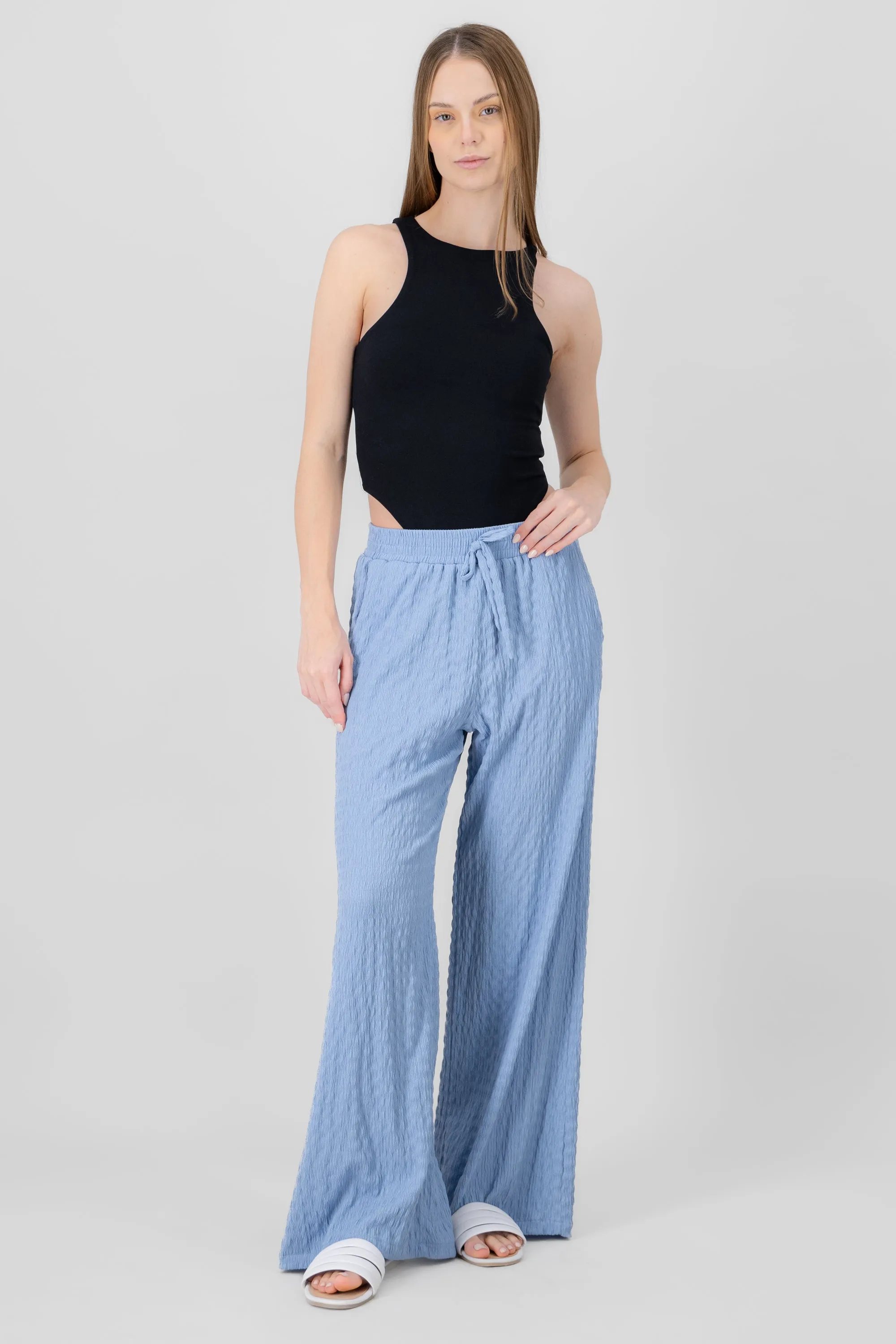 Pantalon fluido sold by Shasa