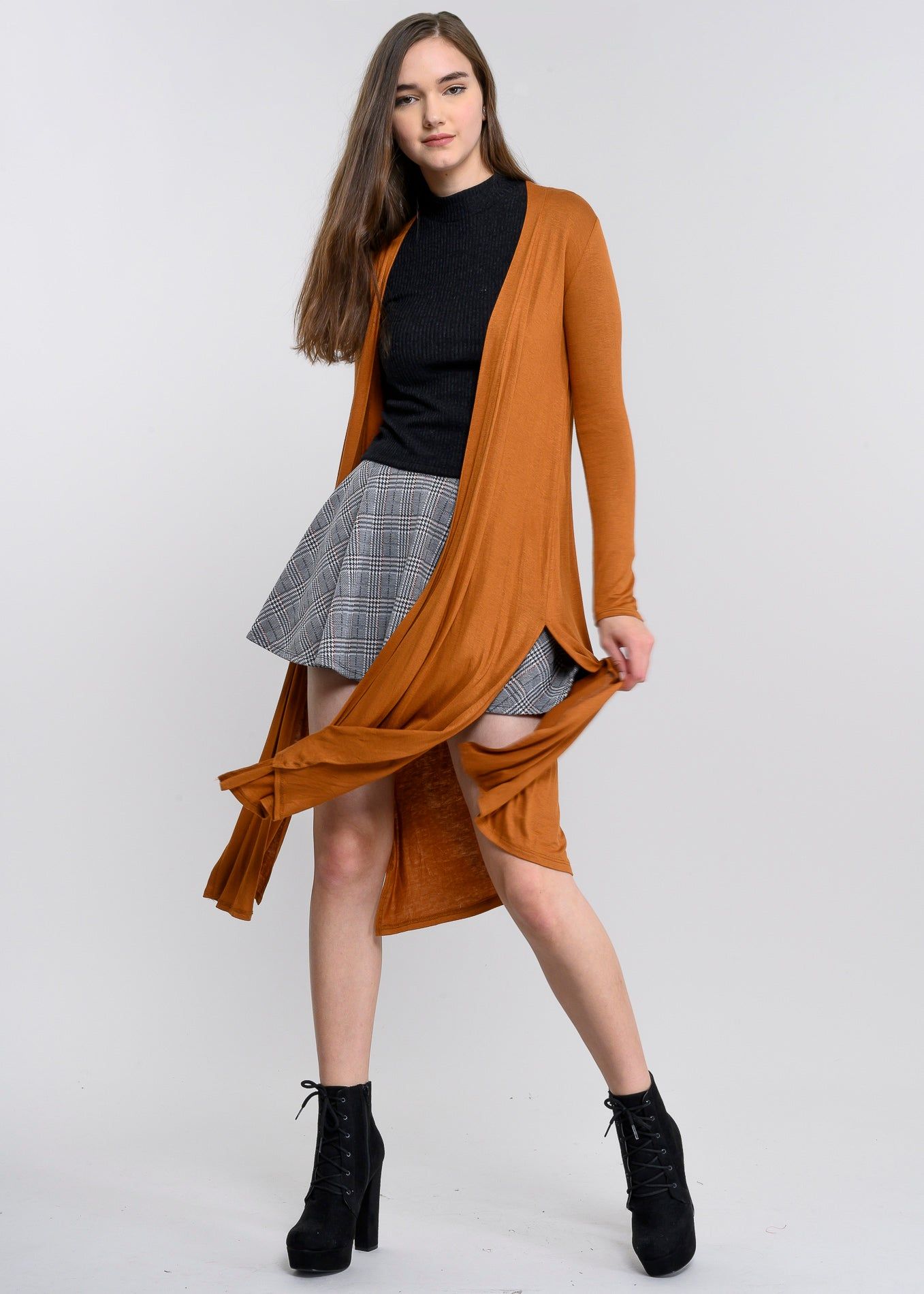 Cárdigan largo aberturas laterales sold by Shasa