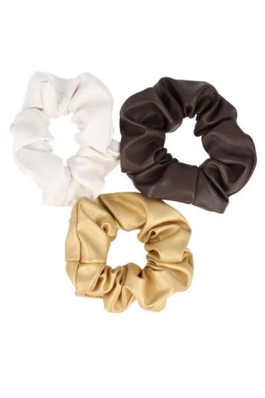 Set 3 scrunchies efecto piel sold by Shasa