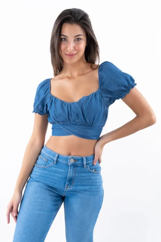 Top denim manga abullonada olán sold by Shasa