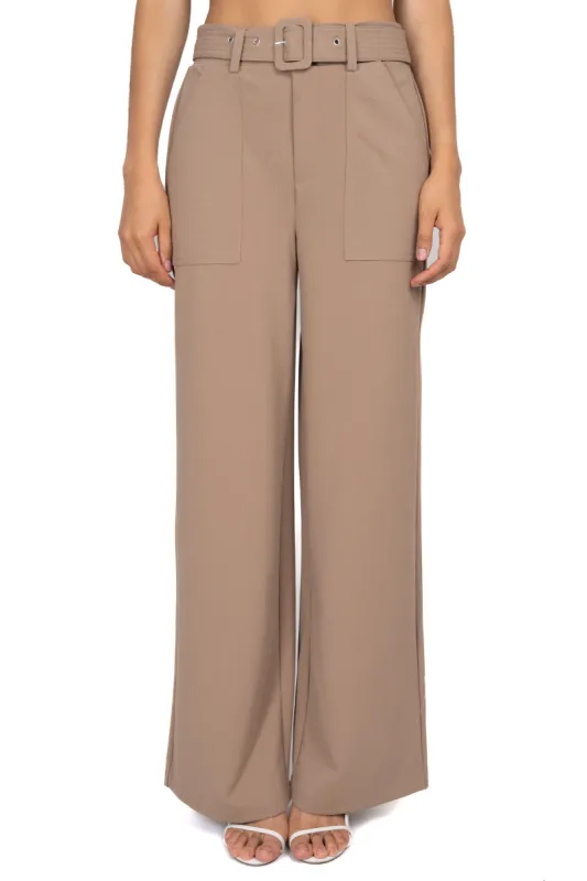Pantalón amplio cinturón bolsillos sold by Shasa