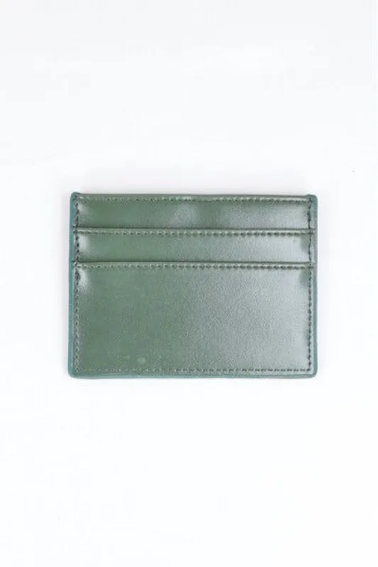 Tarjetero efecto piel monocolor sold by Shasa