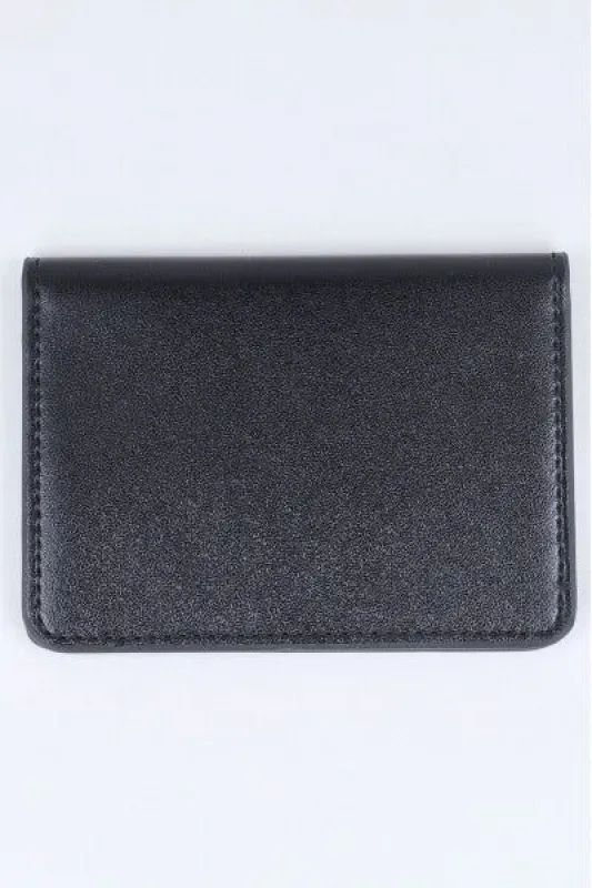 Cartera efecto piel monocolor sold by Shasa