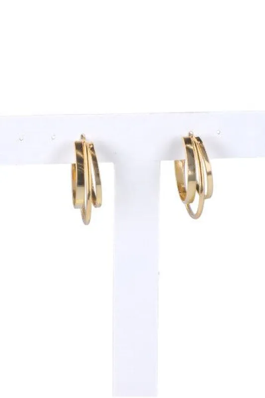 Arracadas metálicas tres líneas sold by Shasa