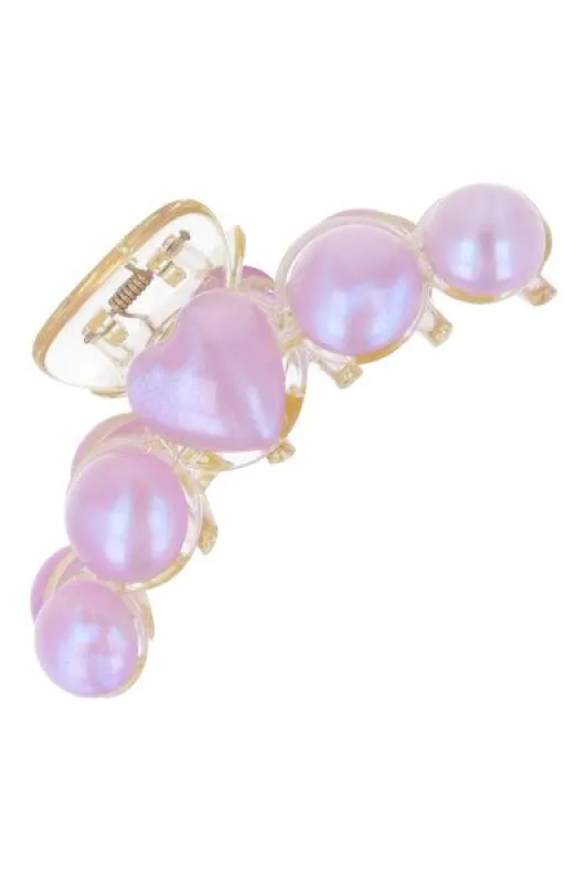 Pinza corazones nacarados sold by Shasa