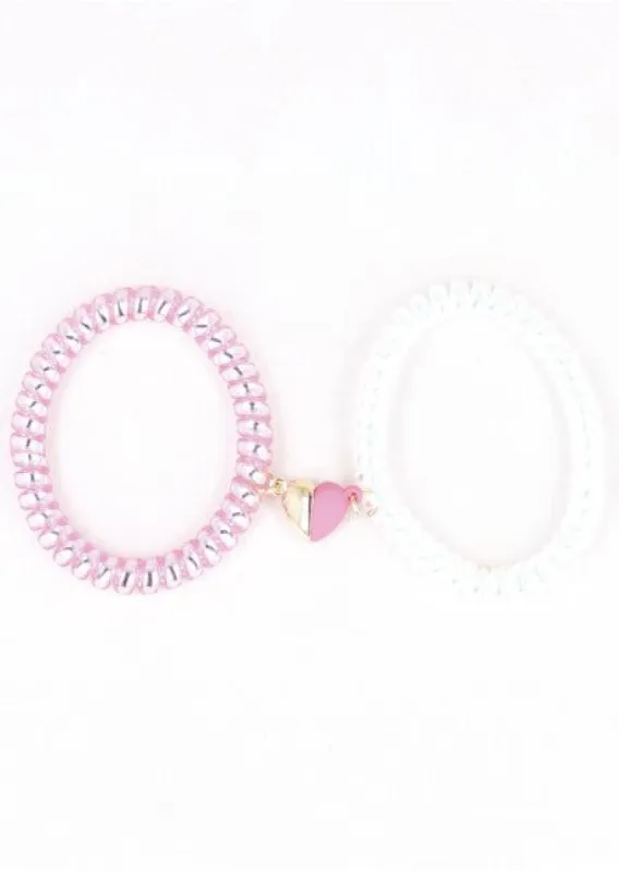 Set Pulseras Telefono Corazon Iman sold by Shasa