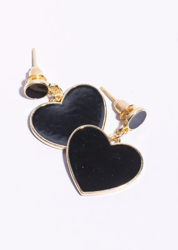 Aretes botón corazón sold by Shasa