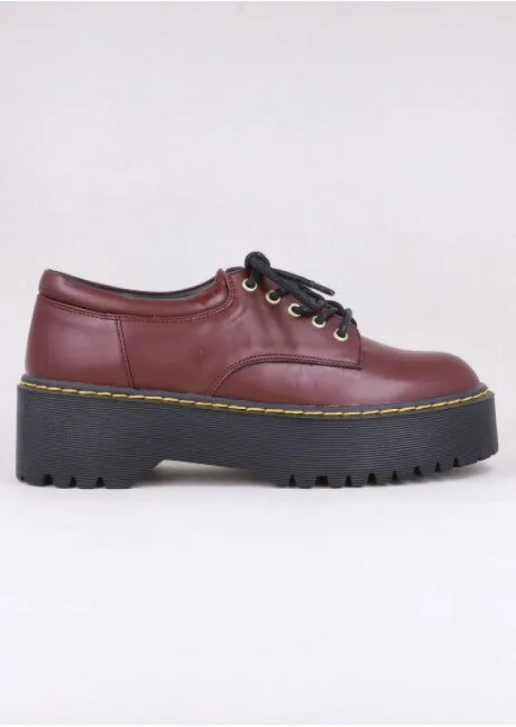 Flat Oxford Agujetas sold by Shasa