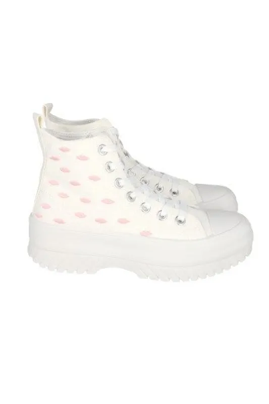 Tenis canvas suela track besos sold by Shasa