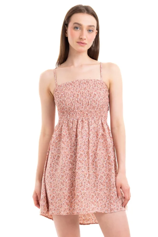 Vestido mini moño flores sold by Shasa