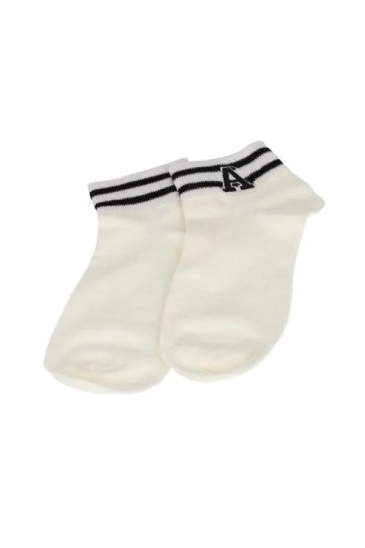 Calcetines bicolor letra bordada sold by Shasa