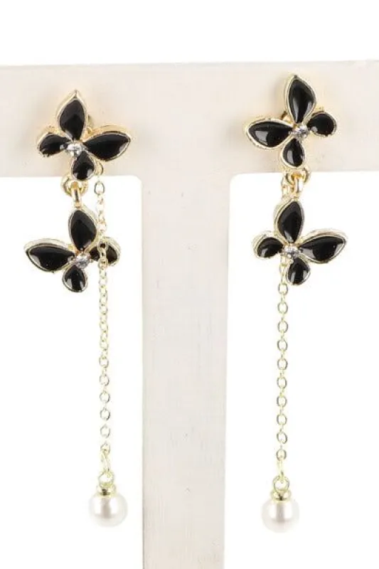 Aretes Doble Mariposa Perla sold by Shasa