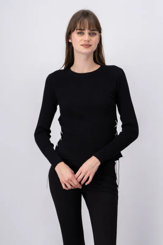 Sueter detalle lazo brillos sold by Shasa