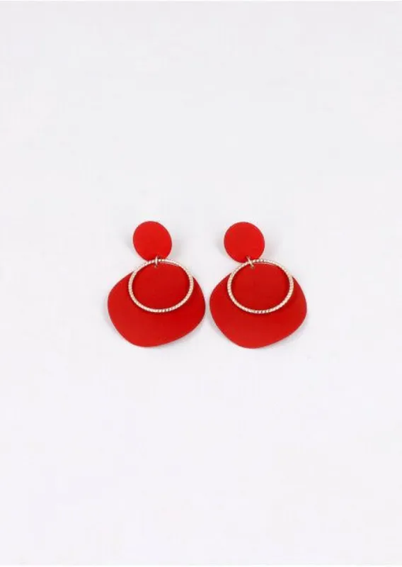 Aretes largos círculo mate sold by Shasa