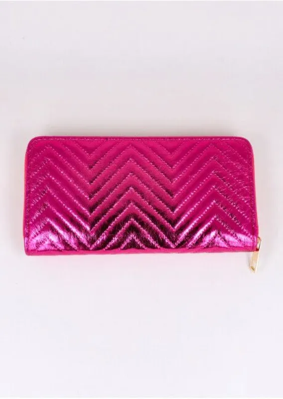 Cartera grecas metalizada sold by Shasa