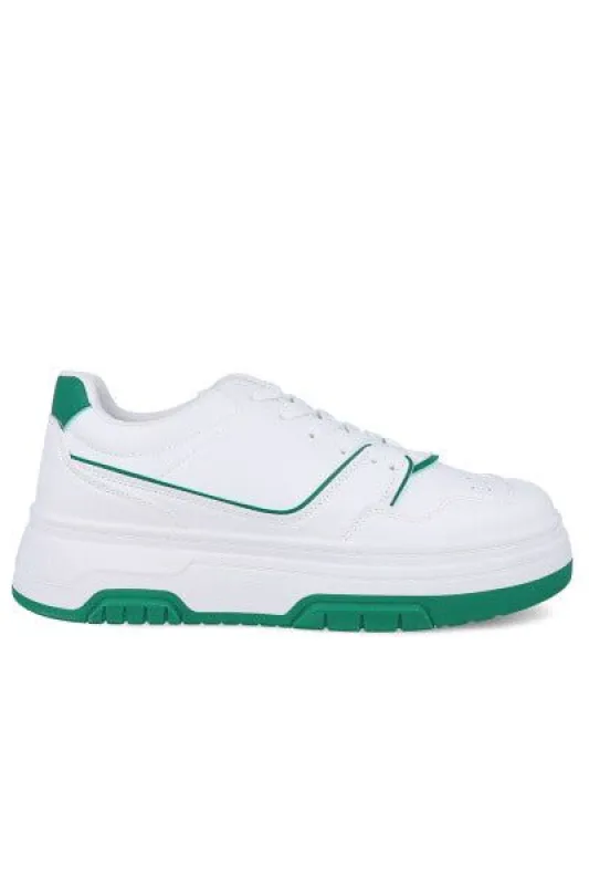 Tenis perforados bicolor sold by Shasa