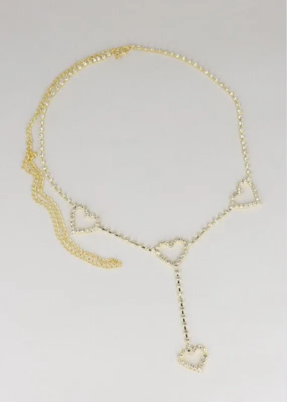 Cinturón cadena corazón brillos sold by Shasa