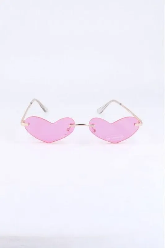 Lentes sol corazón metálicos sold by Shasa