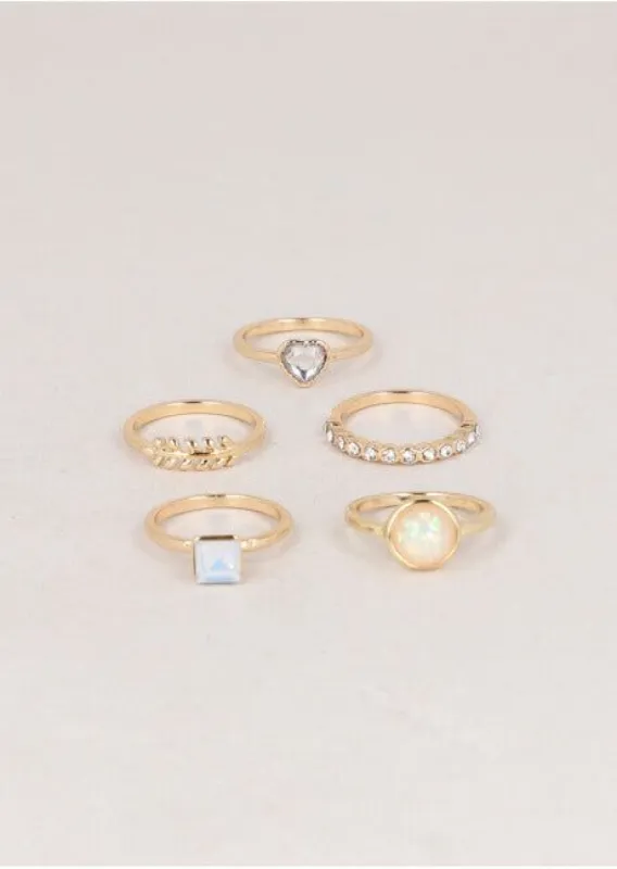 Set 5 anillos metálicos brillo iridiscente sold by Shasa
