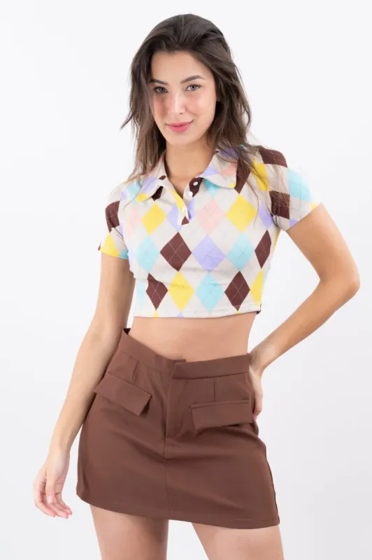 Top cuello polo rombos sold by Shasa