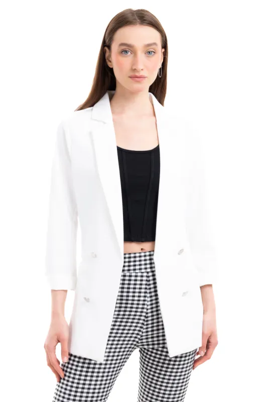 Saco botones doble sold by Shasa